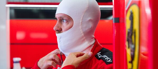 Немецкий гонщик Ferrari Себастьян Феттель - Sputnik Беларусь